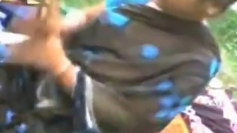 Indian Mature Woman Fondling And Seducing A Young Boy'S Breasts And Vagina